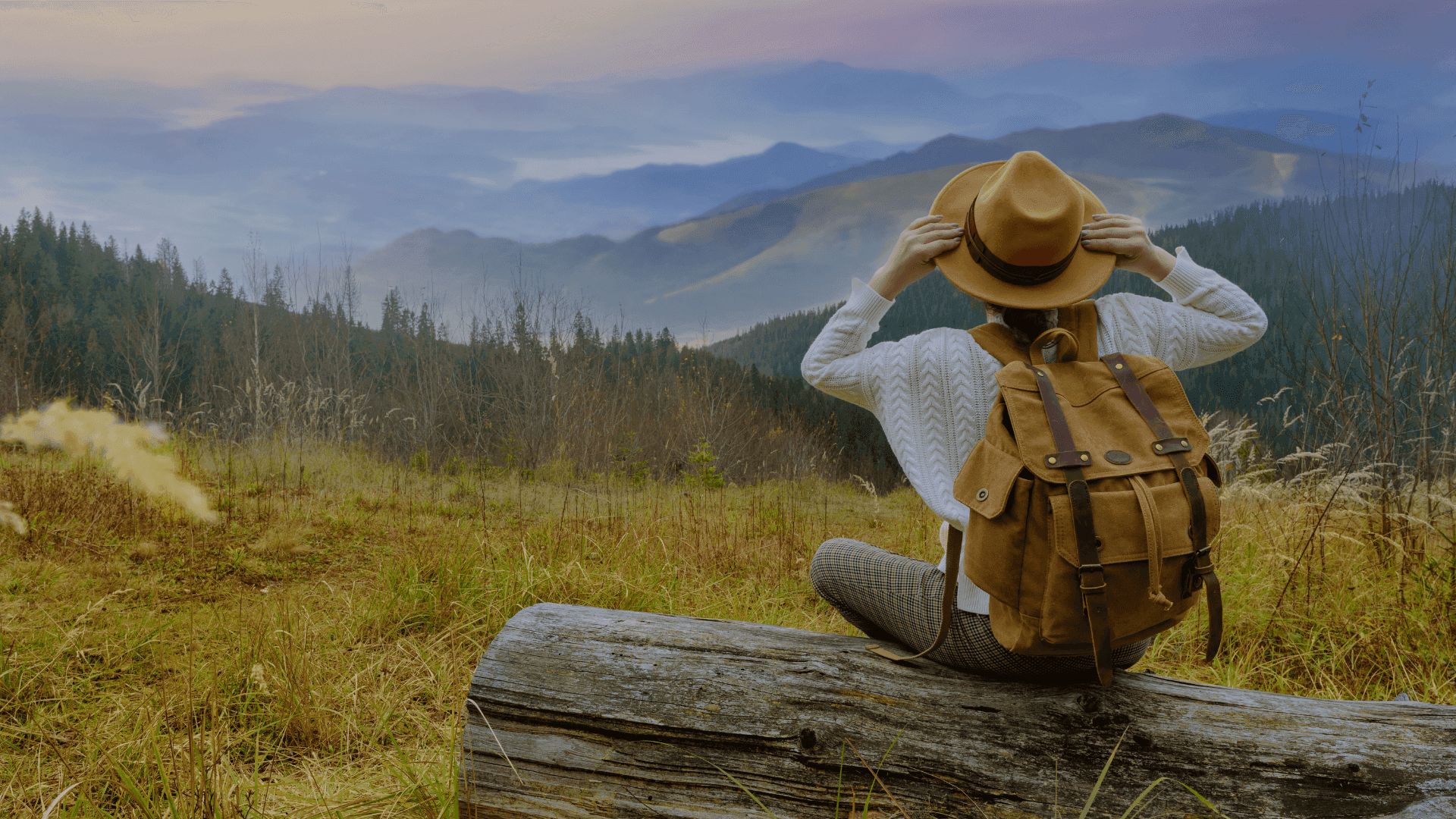 a person seat on nature taking inspiration